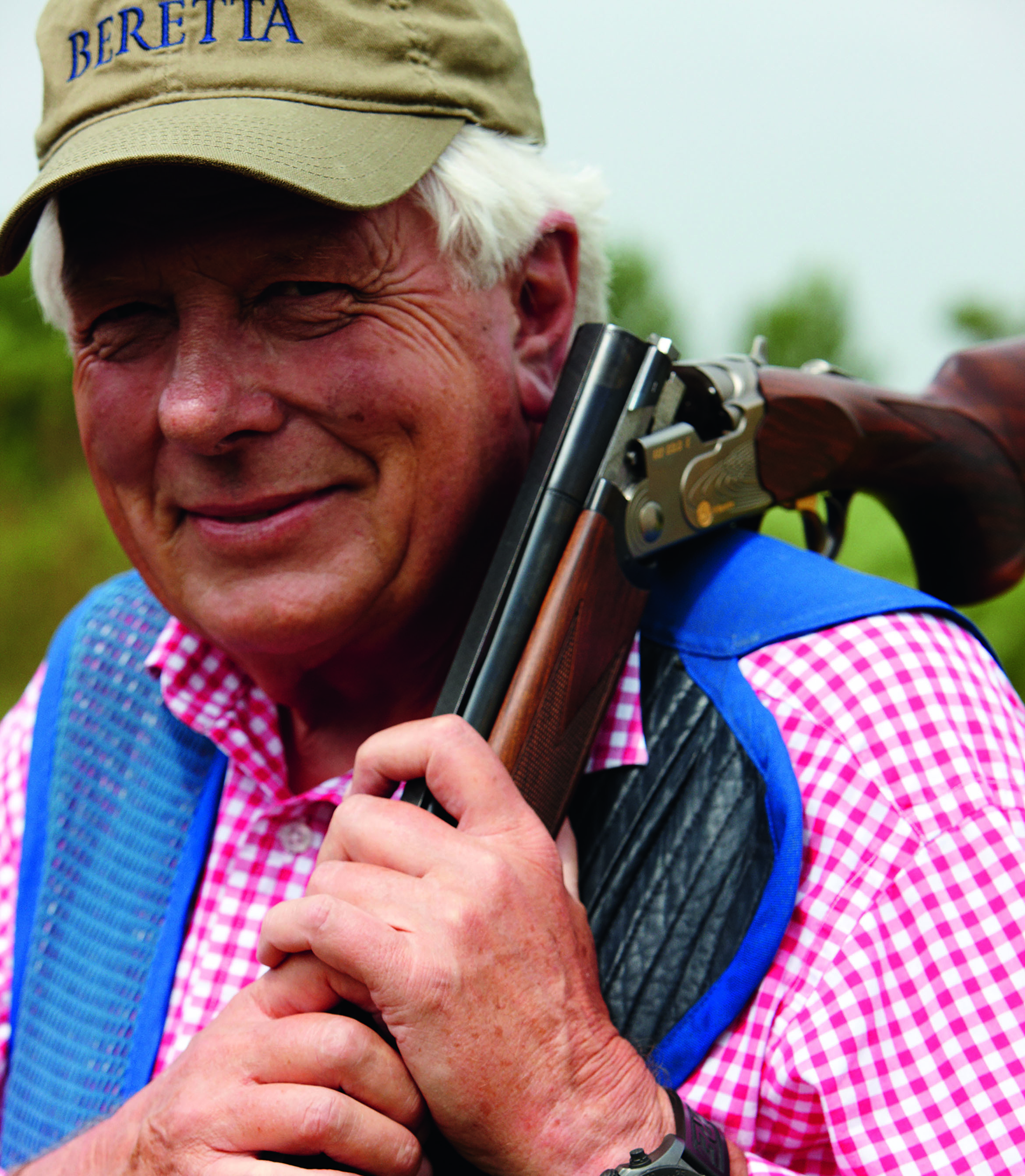 Bjorn Waktare wearing a Beretta cap with a shotgun